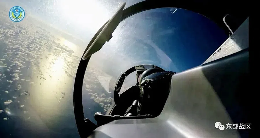 This handout image taken on 9 August 2022 and released by the Eastern Theater Command of the Chinese People's Liberation Army (PLA) on 10 August 2022 shows a PLA fighter jet taking part in a military drill in an undisclosed location. (Handout/Eastern Theater Command of the People's Liberation Army/AFP)