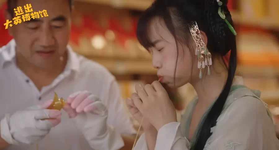 The protagonists tried sugar-blowing on their trip to China.