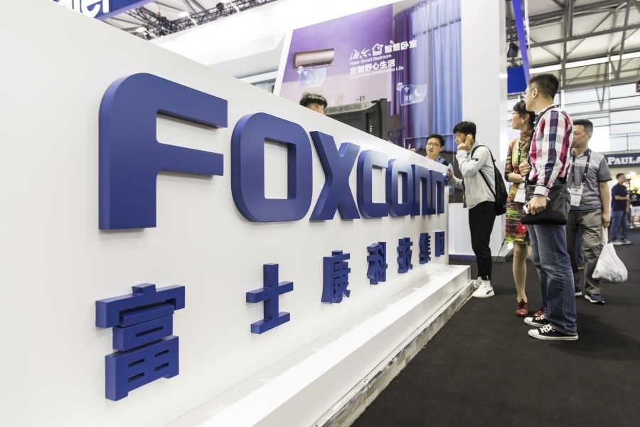 Foxconn is among the Taiwanese companies pulling out of mainland China and returning to Taiwan. (Qilai Shen/Bloomberg)