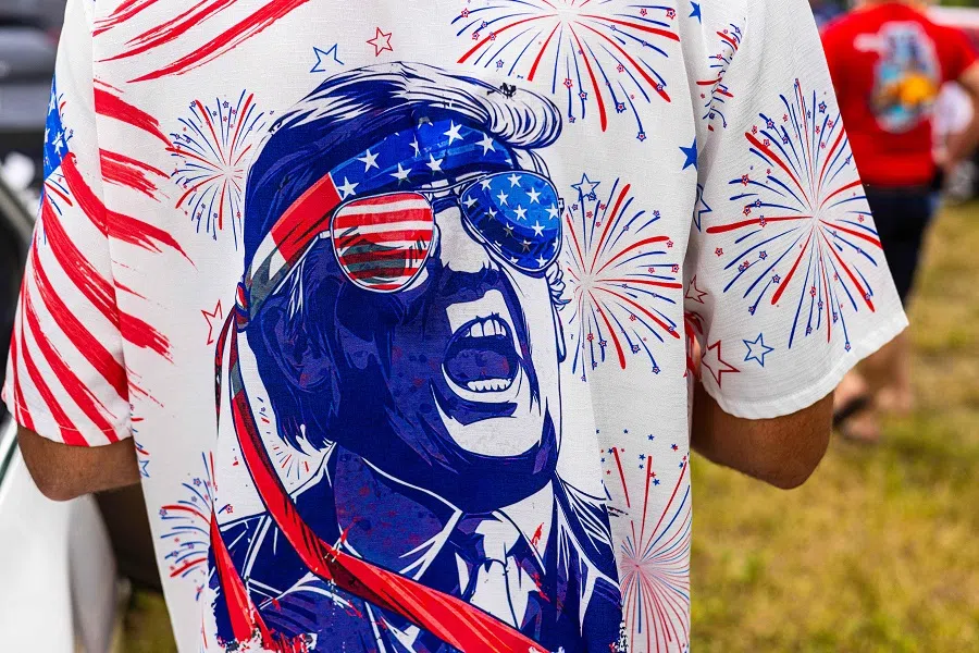Supporters of President-elect Donald Trump participate in a Trump victory parade on 17 November 2024 in West Palm Beach, Florida.