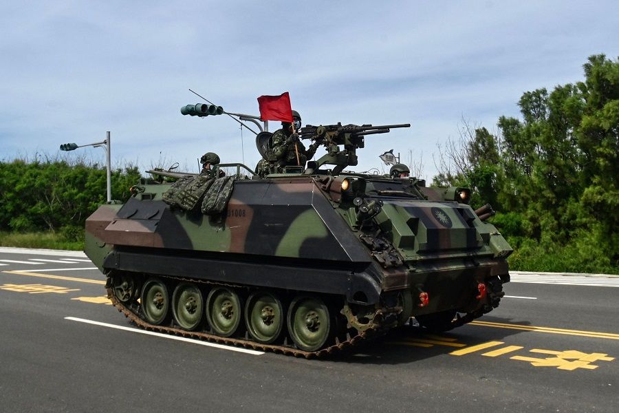 This photo taken on 30 May 2022 shows a Taiwanese heavy military vehicle travelling down a road near Magong on the Penghu islands. (Sam Yeh/AFP)