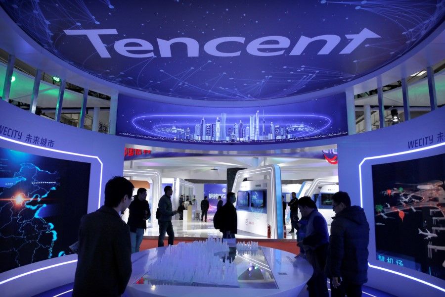 People visit Tencent's booth at the World 5G Exhibition in Beijing, 22 November 2019. (Jason Lee/REUTERS)
