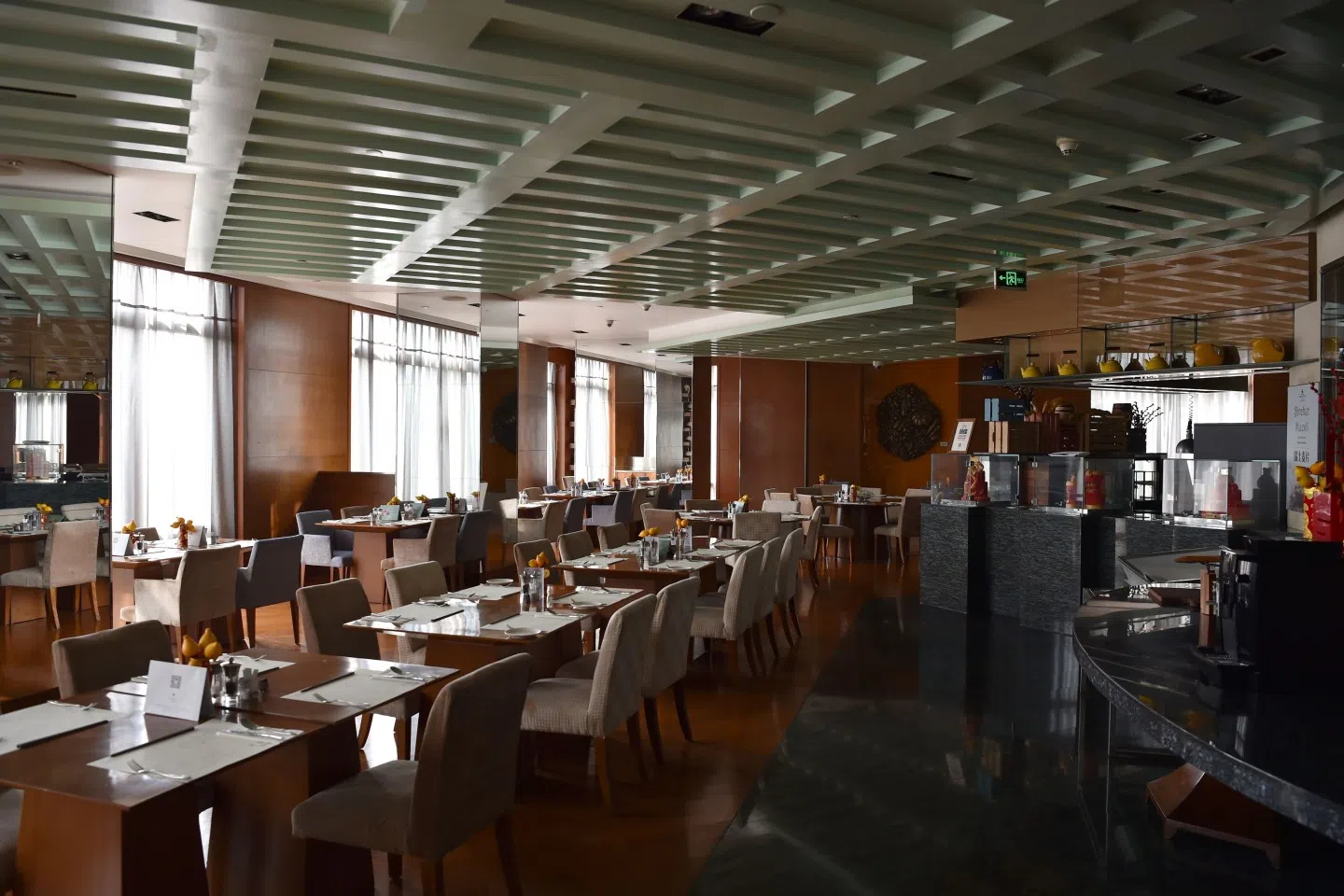 In this photo taken on 29 January 2020, the hotel cafe is pictured empty as guests and visitors stay away due to the Wuhan coronavirus outbreak. (Hector Retamal/AFP)