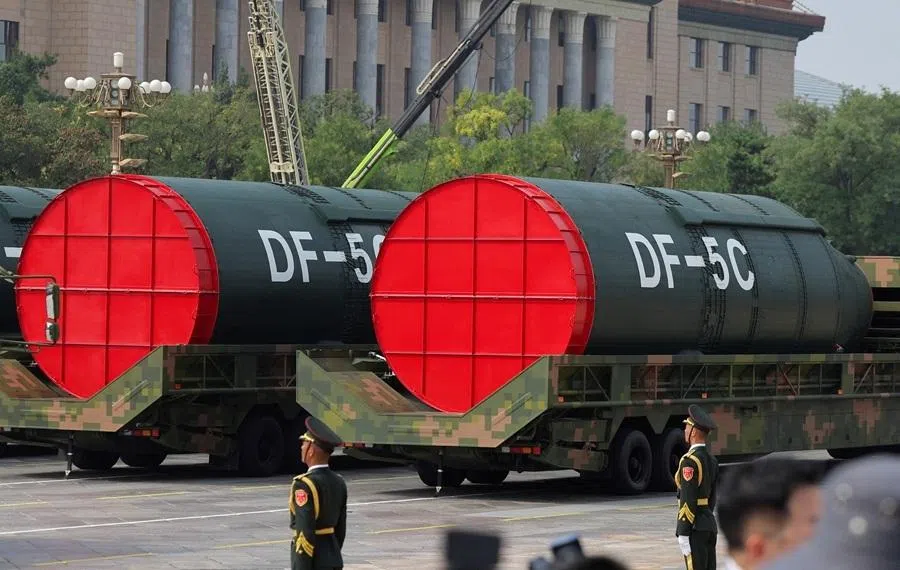Members of the People's Liberation Army stand as the strategic strike group displays DF-5C nuclear missiles during a military parade to mark the 80th anniversary of the end of World War Two, in Beijing, China, on 3 September 2025.