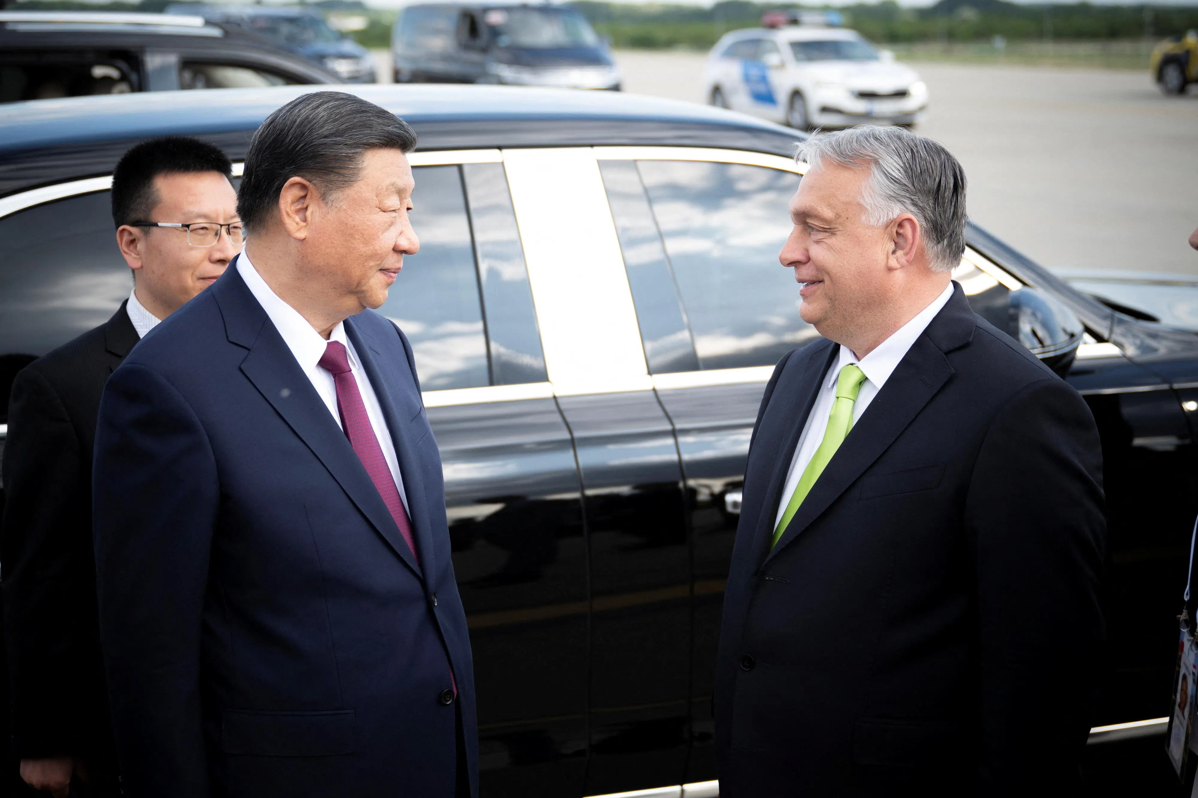 Hungarian Prime Minister Viktor Orban speaks to Chinese President Xi Jinping at the Ferenc Liszt International Airport ahead of his departure following a three-day visit in Budapest, Hungary, on 10 May 2024. (Vivien Cher Benko/PM Office/Handout via Reuters)