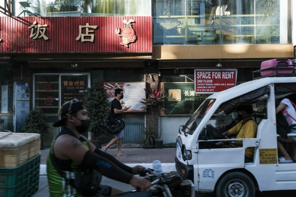 Traffic in front of a Chinese restaurant in Boracay, Aklan, the Philippines, on 23 March 2022. (Veejay Villafranca/Bloomberg)