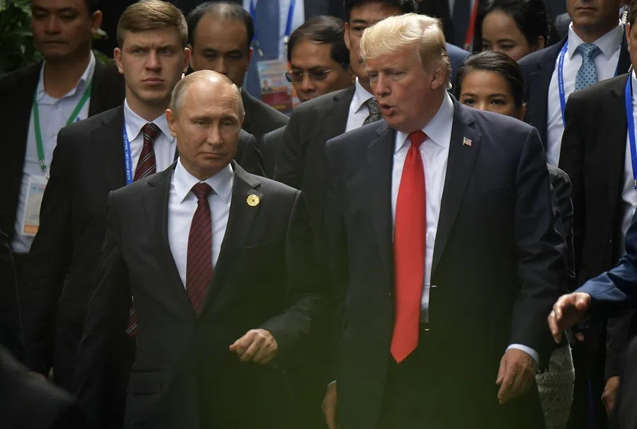Russian President Vladimir Putin (left) and US President Donald Trump at the APEC Economic Leaders Week 2017 in Da Nang, Vietnam, November 2017.