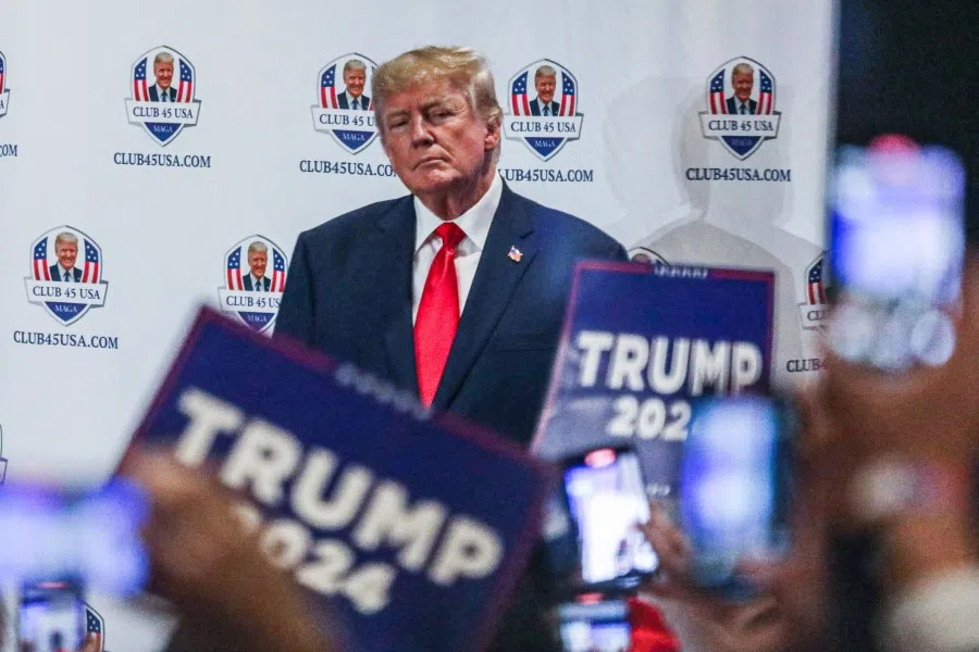 Former US President Donald Trump gestures to supporters during Trump's President Day event at the Hilton Palm Beach Airport in West Palm Beach, Florida, on 20 February 2023. (Giorgio Viera/AFP)