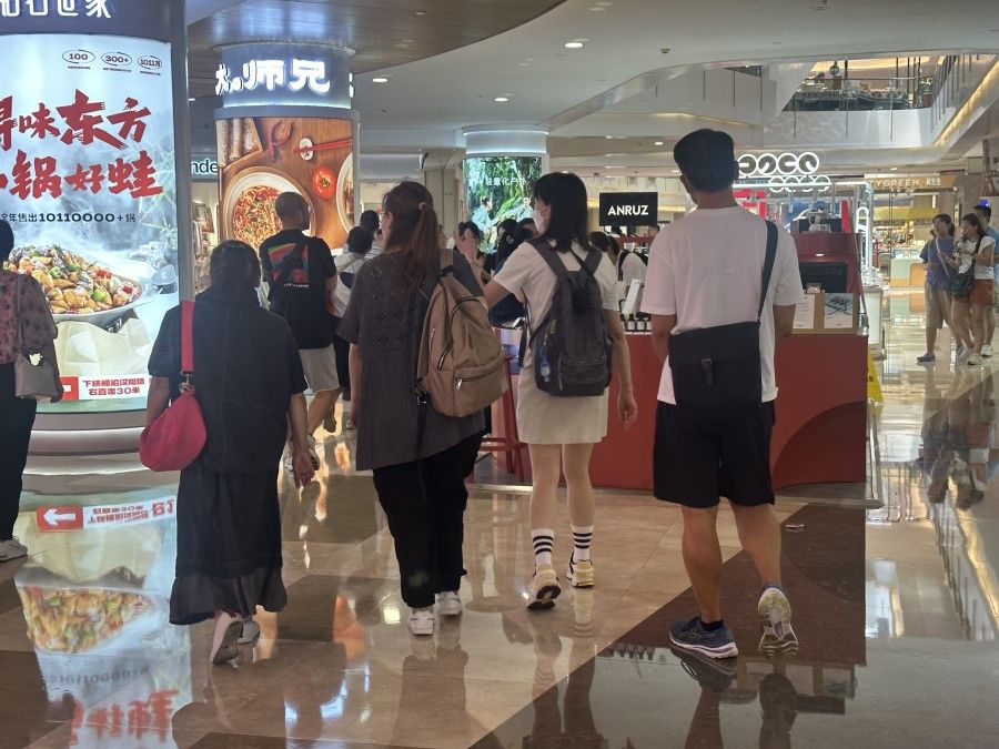 Hong Kongers in Shenzhen are generally seen in groups, wearing sneakers and carry backpacks. (Photo: Daryl Lim)