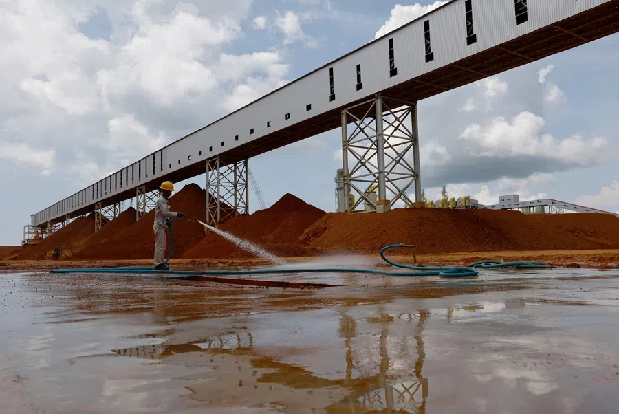 Mounds of bauxite are stored at Shandong Nanshan Aluminium's integrated aluminium plant in Bintan, Indonesia, in a picture taken on 5 May 2023. (Edgar Su/Reuters)