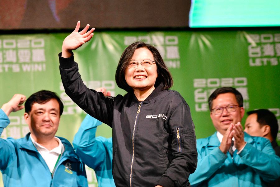 Taiwan's President Tsai Ing-wen waves to supporters outside her campaign headquarters in Taipei on 11 January 2020. (Sam Yeh/AFP)