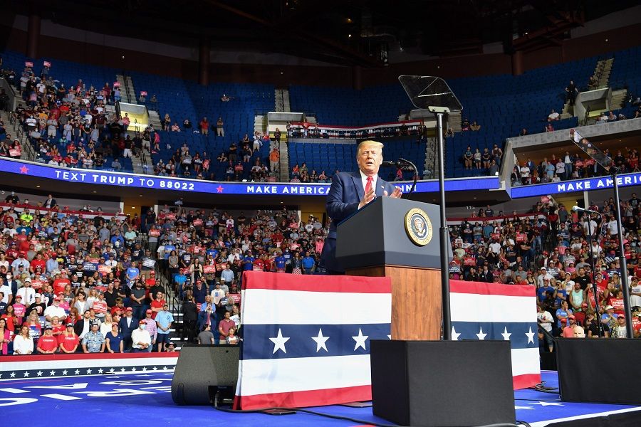 The upper section is seen partially empty as US President Donald Trump speaks during a campaign rally at the BOK Center on 20 June 2020 in Tulsa, Oklahoma. (Nicholas Kamm/AFP)