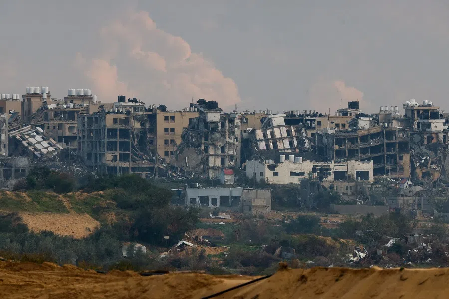 Destroyed buildings lie in ruin in the Gaza Strip, amid the ongoing conflict between Israel and Hamas, as seen from Israel, on 2 January 2024. (Amir Cohen/Reuters)