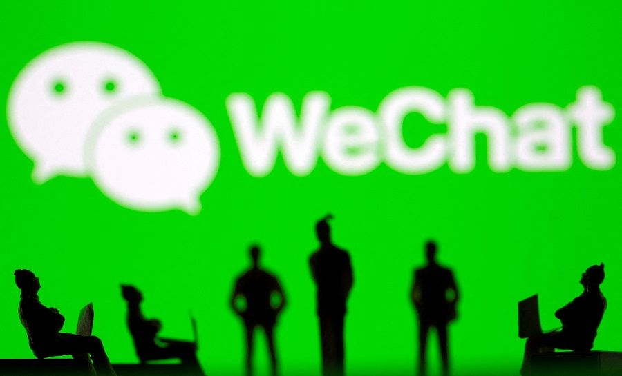 Small toy figures are seen in front of WeChat logo in this illustration picture taken on 15 March 2021. (Dado Ruvic/Illustration/File Photo/Reuters)