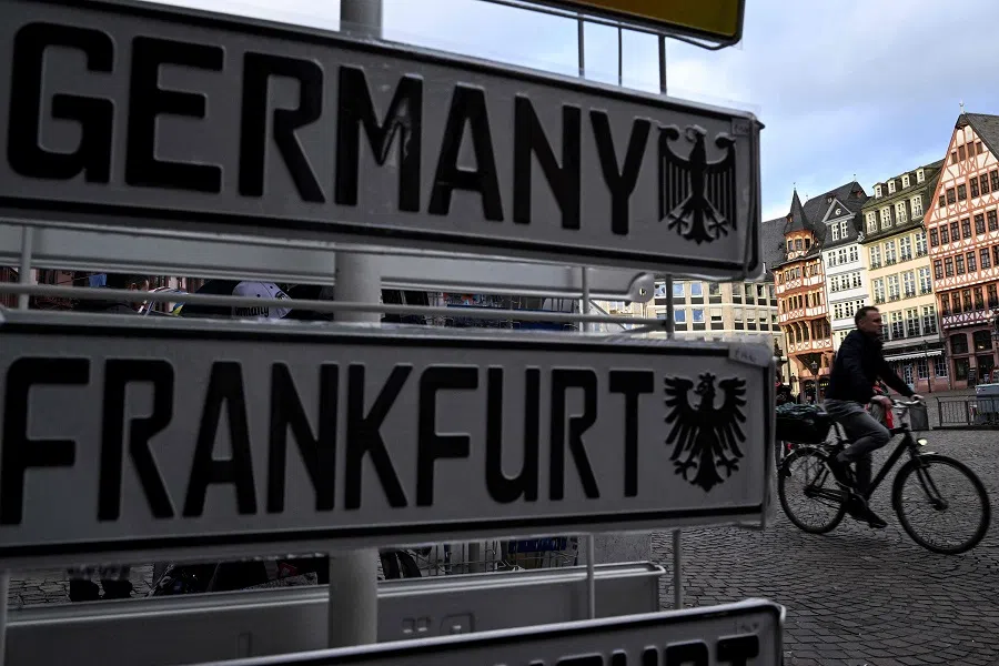 A man rides a bicycle on the Roemerplatz, the city's central square in Frankfurt am Main, western Germany, on 3 January 2024. (Kirill Kudryavtsev/AFP)