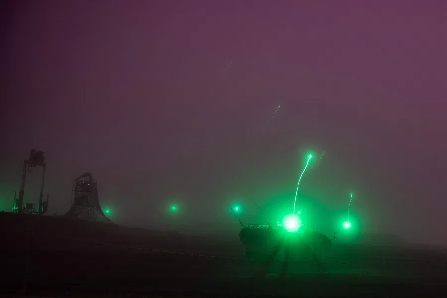 This long exposure picture shows a Japan Ground Self-Defense Forces (JGSDF) live fire exercise at the JGSDF's training grounds in the East Fuji Maneuver Area in Gotemba on 22 May 2021. (Philip Fong/AFP)
