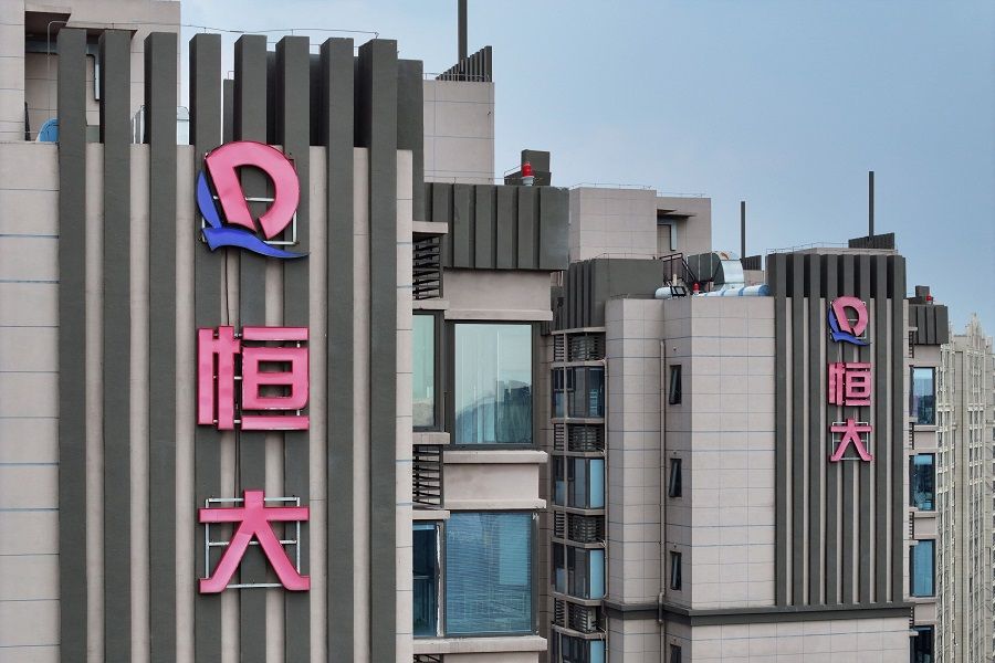 The Evergrande logo is seen on residential buildings in Nanjing, Jiangsu province, China, on 18 August 2023. (STR/AFP)