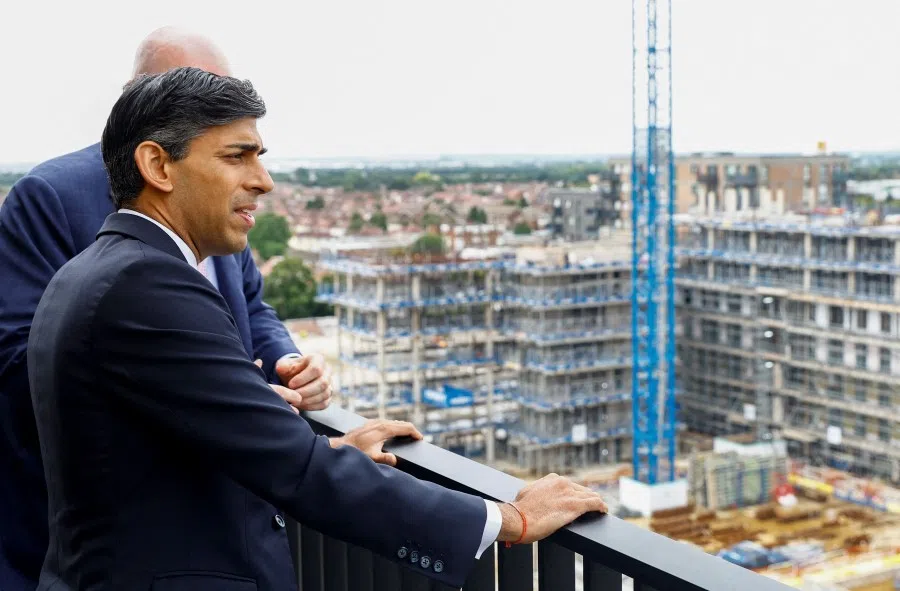 Britain's Prime Minister Rishi Sunak at a new housing development under construction on a site in London, 27 July 2023. (Peter Cziborra/AFP)