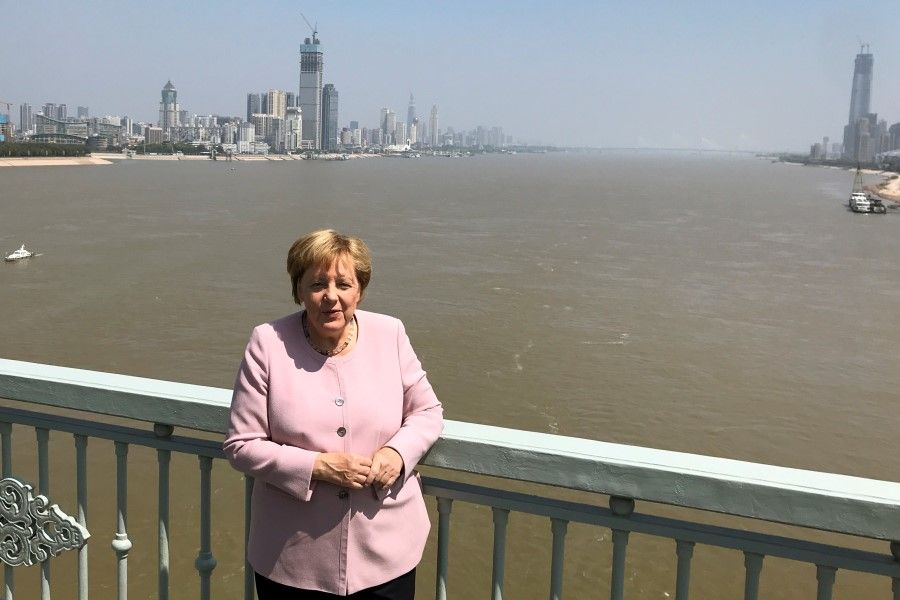 German Chancellor Angela Merkel on a bridge crossing the Yangtze River in Wuhan, China, 7 September 2019. (Andreas Rinke/REUTERS)