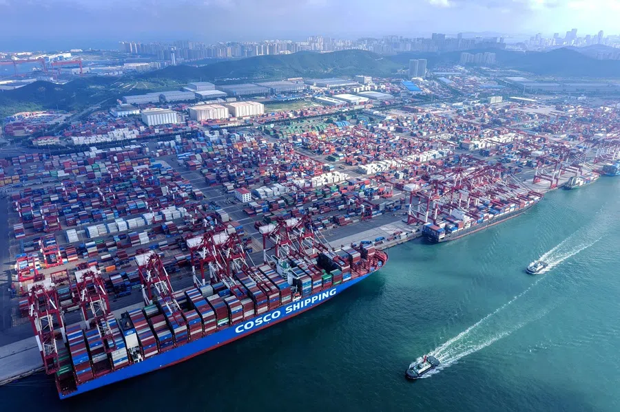 Container ships are seen at the port in Qingdao, Shandong province, China, on 25 July 2025. (AFP)