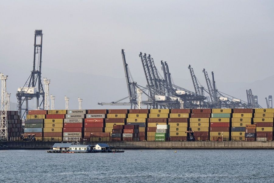 Shipping containers and gantry cranes at the Yantian International Container Terminals in Shenzhen, China, on 16 January 2024. (Qilai Shen/Bloomberg)