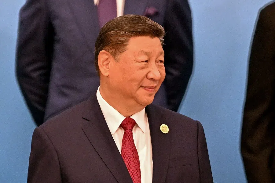 China’s President Xi Jinping looks on as he stands with leaders from African countries for a group photo before the opening ceremony of the Forum on China-Africa Cooperation (FOCAC) at the Great Hall of the People in Beijing on 5 September 2024. (Adek Berry/AFP)