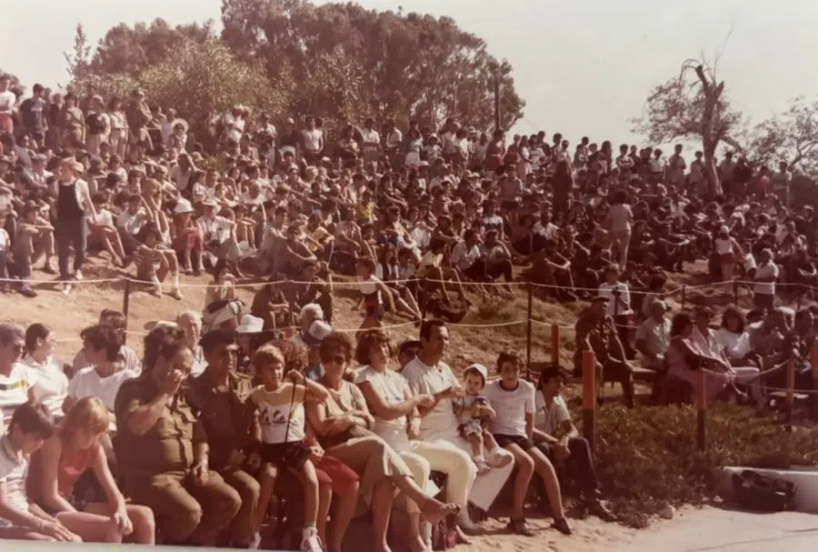 Family members participating in sports activities during the visitation event.