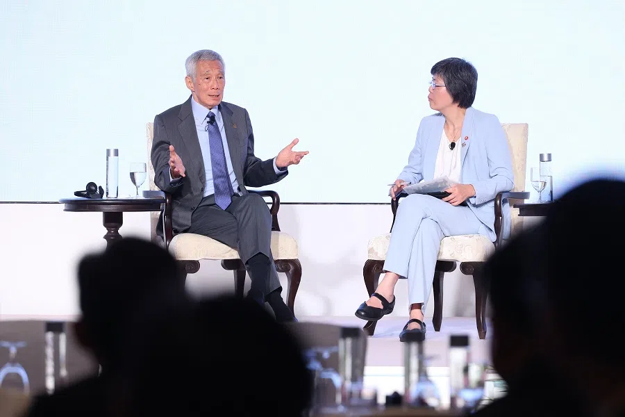 Senior Minister Lee Hsien Loong responds to a question during a dialogue moderated by Lee Huay Leng, editor-in-chief of Chinese Media Group at SPH Media. (SPH Media)