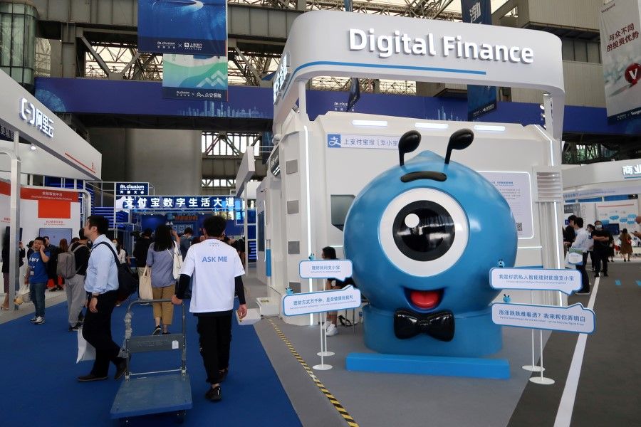 An Ant booth of digital finance products is seen at a fair during a fintech conference in Shanghai, China, 24 September 2020. (Cheng Leng/REUTERS)