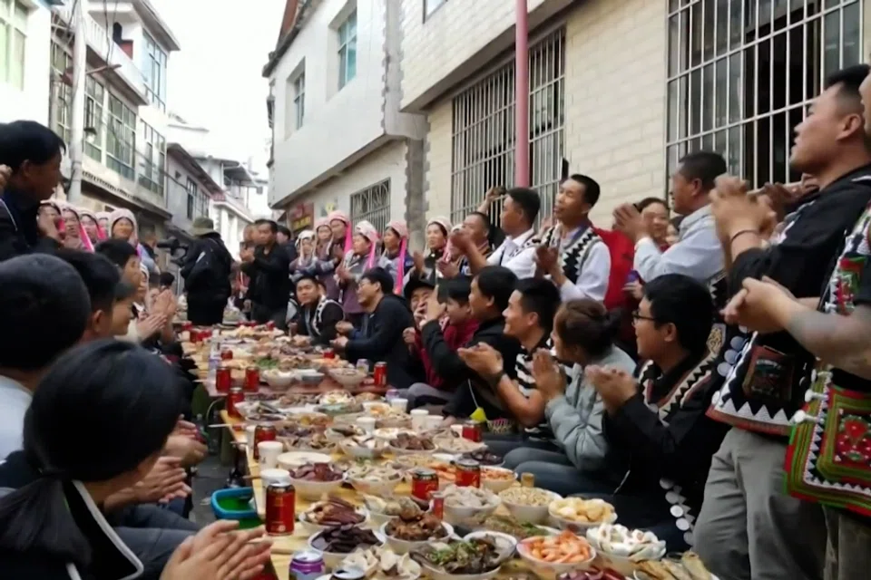 Long table banquet held in Habo Village, Yunnan, China, on 3 January 2024. (CCTV)