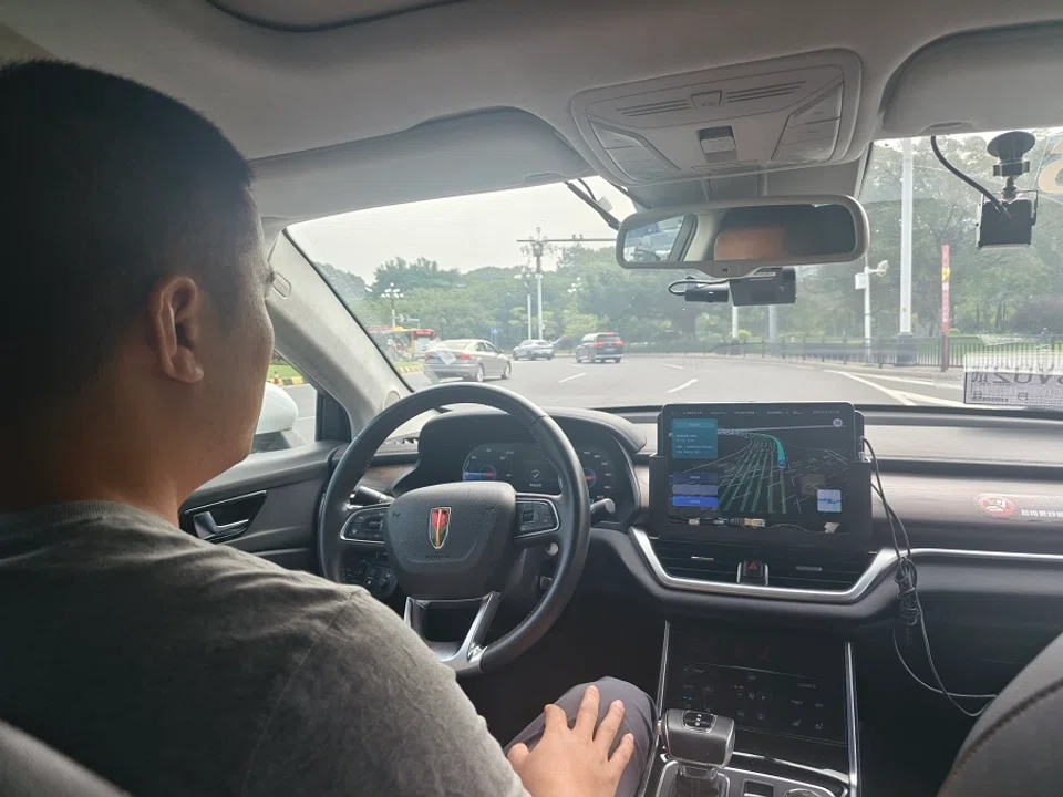 Most self-driving cars still have a safety driver in the driver's seat, but they only intervene in the event of an emergency. (Photo: Zeng Shi)