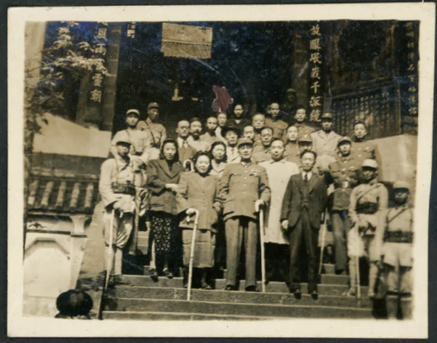 Bai Chongxi and his wife Ma Peizhang (centre) at an ancient temple.