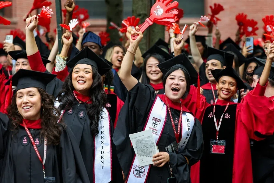 Graduates cheer during the 375th Commencement Exercises at Harvard University in Cambridge, Massachusetts, US, on 28 May 2026.