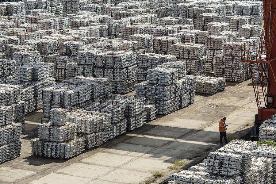 Piles of aluminum ingots at a stockyard in Wuxi, Jiangsu province, China, on 30 September 2021. (Qilai Shen/Bloomberg)