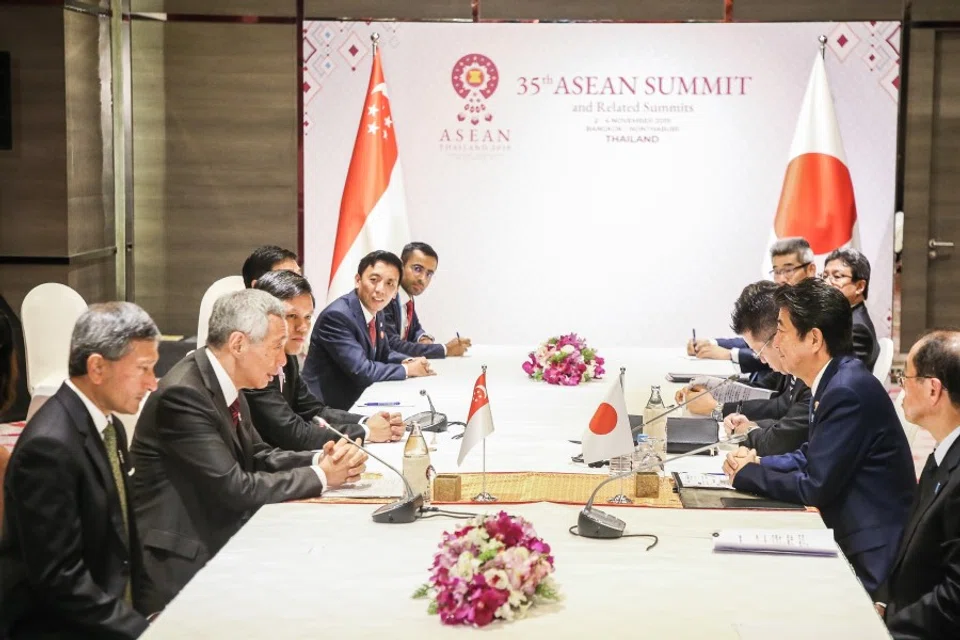 Singapore's Prime Minister Lee Hsien Loong (left, with mic) and Japanese Prime Minister Shinzo Abe had a bilateral meeting on the sidelines of the 2019 ASEAN summit. (SPH)