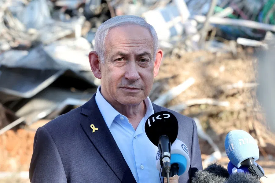 Israel’s Prime Minister Benjamin Netanyahu gives a statement during a visit to the site of the Weizmann Institute of Science, which was hit by an Iranian missile barrage, in the central city of Rehovot, Israel, on 20 June 2025. (Jack Guez/Reuters)