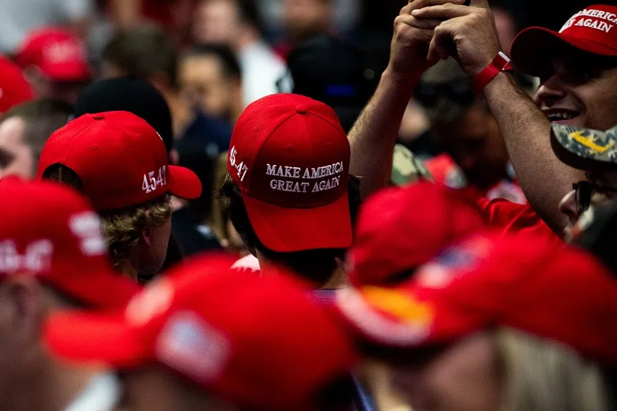 Attendees during a campaign event with former US President Donald Trump, not pictured, in Grand Rapids, Michigan, US, 20 July 2024. (Emily Elconin/Bloomberg)