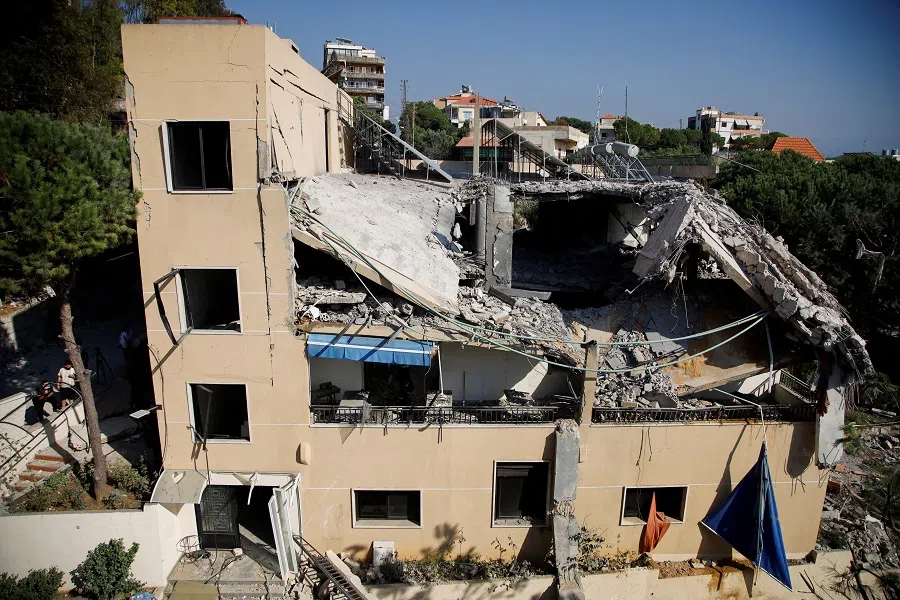 A view shows a damaged building in the aftermath of an Israeli strike that hit a building, amid ongoing cross-border hostilities between Hezbollah and Israeli forces, in the town of Wardaniyeh, Lebanon, on 9 October 2024.