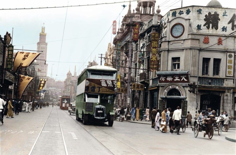Double decker buses and electric rails on Nanjing Road during the Nationalist period. Nanjing Road was the first commercial street established after Shanghai opened up. With foreign investments, companies funded by overseas Chinese, and speciality shops, Nanjing Road became Shanghai's busiest street, lined with Western-style houses, shop signs and advertising everywhere, and passers-by weaving their way through the sidewalks.