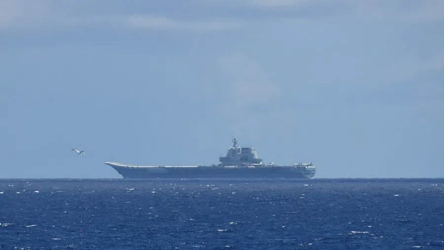 This handout photo taken on 9 July 2024 and released on 10 July by Japan’s Ministry of Defense shows the Chinese navy’s aircraft carrier Shandong in the Pacific Ocean southeast of Miyakojima, Okinawa prefecture. (Handout/Japan’s Ministry of Defense/AFP)