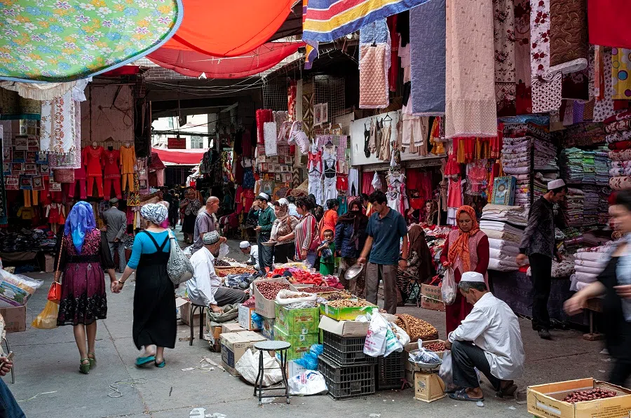 People at a street market in the city of Kashgar, Xinjiang, China, on 14 August 2012.