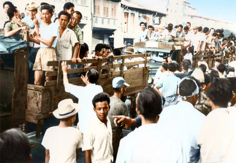 A community event to send off young men to National Service (NS), 1967. That year, the government passed a law for male Singaporeans aged 18 and second generation male permanent residents to undergo mandatory military service. They went through three months of basic training, after which they were deployed to the Singapore Armed Forces, Singapore Police Force and Singapore Civil Defence Force units for a total of two years.