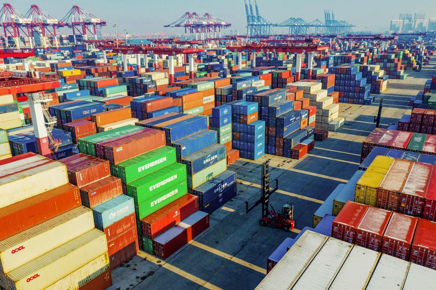 Containers are seen stacked at a port in Qingdao in China's eastern Shandong province. (STR/AFP)
