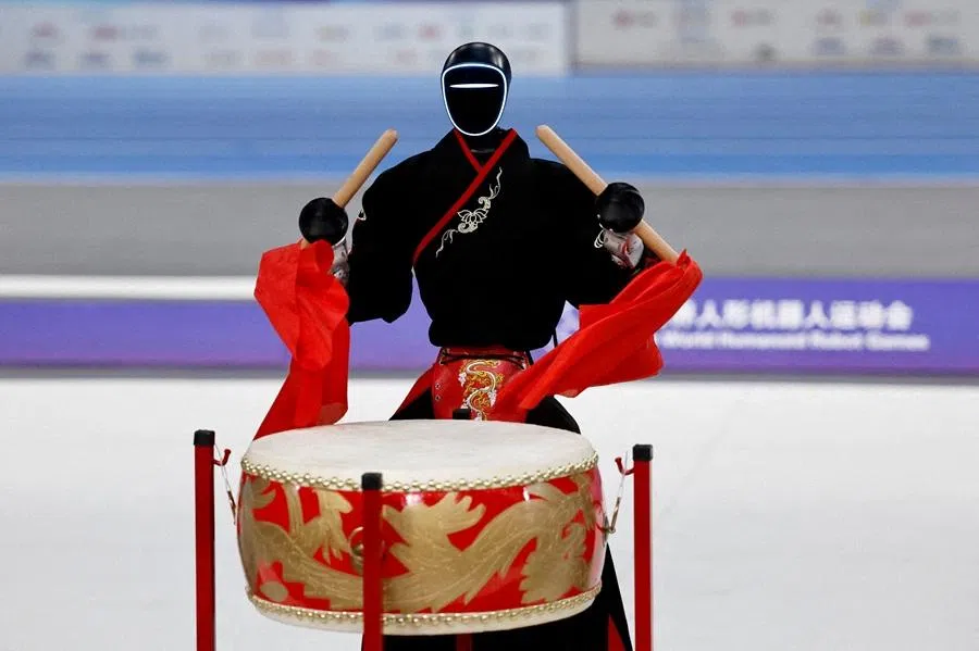 A Unitree Robotics humanoid robot takes part in the freestyle competition at the inaugural World Humanoid Robot Games, at the National Speed Skating Oval in Beijing, China, on 15 August 2025. (Tingshu Wang/Reuters)