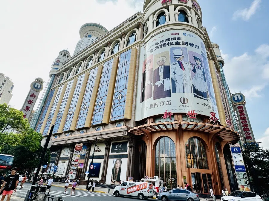 A three-storey advertisement for a Detective Conan-themed restaurant decorates the New World City complex in Shanghai. (Photo: Chen Jing)