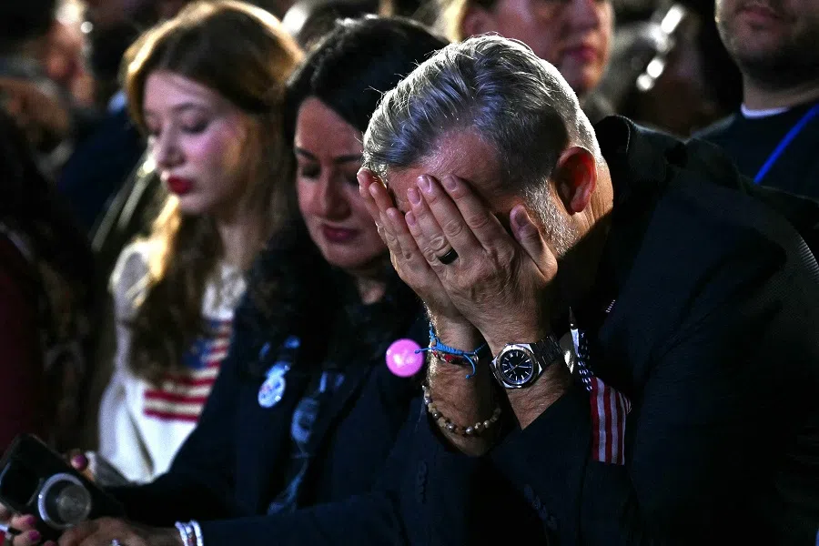 A supporter reacts to election results during an election night event for US Vice President and Democratic presidential candidate Kamala Harris at Howard University in Washington, DC, US, on 5 November 2024. (Angela Weiss/AFP)