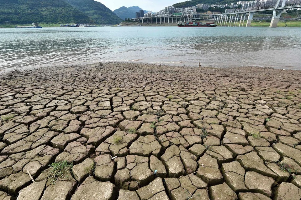 This photo taken on 16 August 2022 shows a section of a parched riverbed along the Yangtze River in Chongqing, China. (AFP)