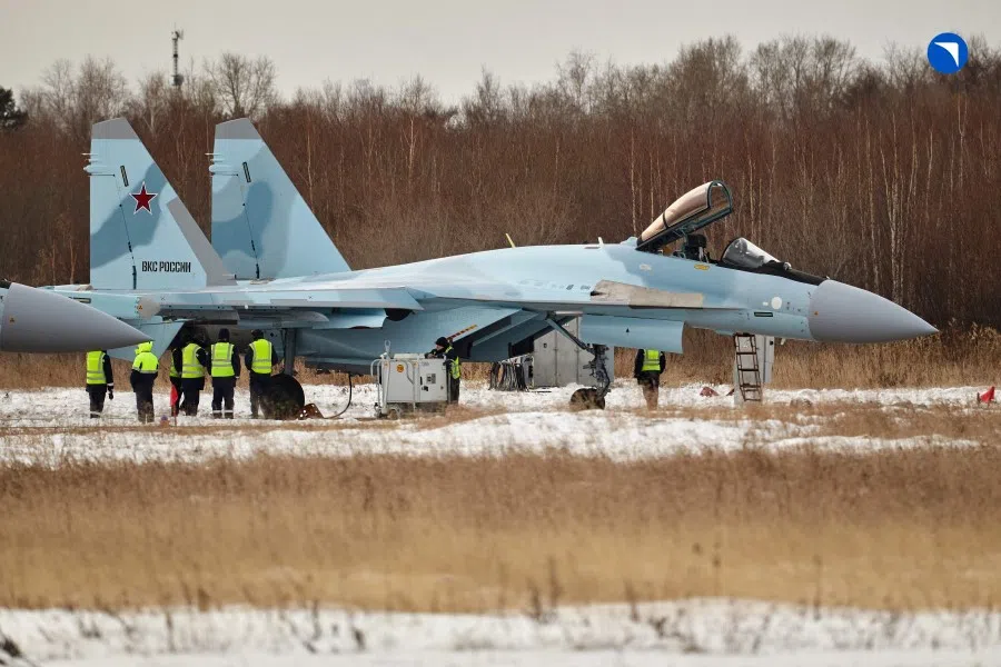 This handout picture provided by the Russian defence corporation Rostec on 24 November 2023 shows a Sukhoi Su-35S fighter jet at the grounds of an aviation firm in the far eastern city of Komsomolsk-on-Amur. (Handout/Russian defence corporation Rostec/AFP)