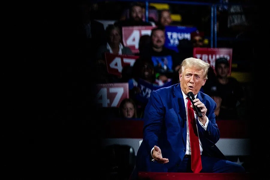 Former US President Donald Trump speaks during a town hall event at Dort Financial Center in Flint, Michigan, US, on 17 September 2024. (Emily Elconin/Bloomberg)