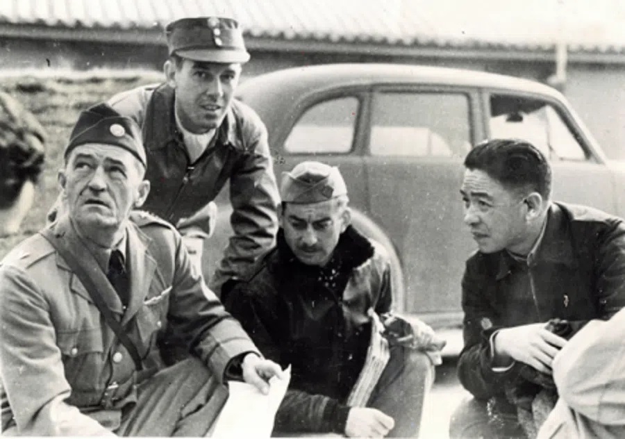 Claire Lee Chennault and the Flying Tigers discuss battle plans with General Mao Bangchu of China on 12 June 1942.